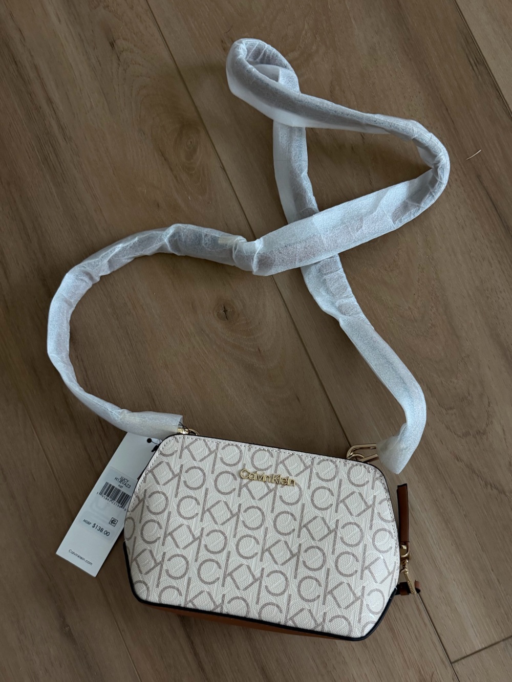 Calvin Klein Ivory Signature Logo Crossbody Bag with Brown Trim